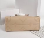 Louis Vuitton Monogram Empreinte Giant Onthego MM Bag In Beige - Image 4