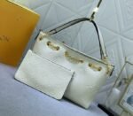 Louis Vuitton Monogram Empreinte Leather Bundle Bag In Cream - Image 2