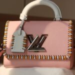 Louis Vuitton Epi Leather Twist MM Bag In Rose Bellerin Pink With Braided Edges Flap
