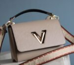 Louis Vuitton Epi Leather Twist MM Handbag In Galet Gray With Embroidered Strap - Image 3