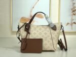 Louis Vuitton Mahina Leather Hina PM