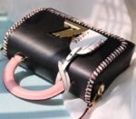 Louis Vuitton Epi Leather Twist MM Bag In Black With Braided Edges Flap - Image 4