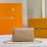 Louis Vuitton Coussin Pochette In Camel