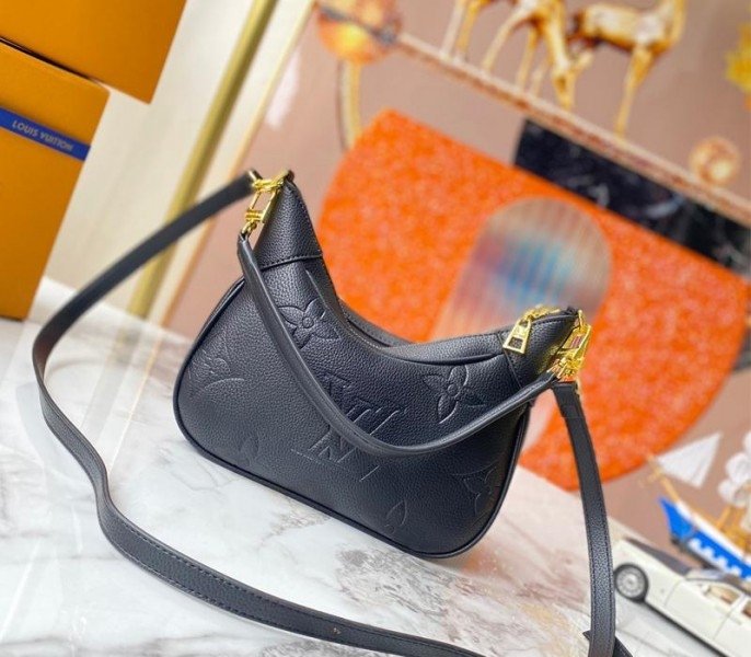 12BE0133-FBBA-87A5-A6FA-5C46E698CAE0.jpg Louis Vuitton Monogram Empreinte Leather Bagatelle Mini Hobo In Black - Image 1
