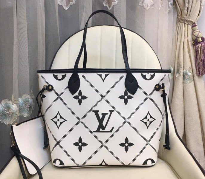 13283082-B4EF-DF82-8067-0617ABC52CD8.jpg Louis Vuitton Spring 2022 Monogram Empreinte Neverfull MM Tote In Cream - Image 1
