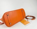 Louis Vuitton Epi Leather Alma PM Handbag In Orange With Jacquard Strap - Image 6