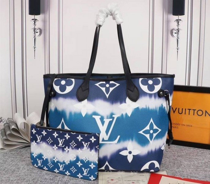 1FB2A4EA-C7CA-4919-B615-0A57D11E62C4.jpg Louis Vuitton Seasonal Escale Neverfull MM Tote In Blue - Image 1