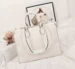 Louis Vuitton Monogram Empreinte Giant Onthego GM Tote In Cream - Image 2