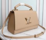 Louis Vuitton Twist One Handle MM Handbag In Beige - Image 2