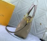 Louis Vuitton Bicolor Monogram Empreinte Bundle Bag In Tourterelle Gray and Cream - Image 4