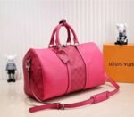 Louis Vuitton Taiga Leather Keepall Bandouliere 50 Travel Bag In Pink - Image 2