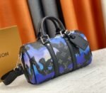Louis Vuitton Monogram Eclipse Keepall Bandouliere 25 Travel Bag In Blue And Purple Sunrise - Image 2