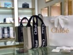 Top Quality Replica Chloe Small Woody Tote Bag in Canvas with Black Leather Strips - Image 2