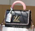 Louis Vuitton Epi Leather Twist MM Bag In Black With Braided Edges Flap