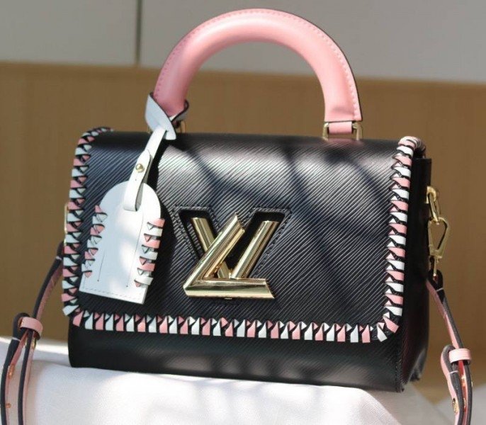 2ED29860-0B82-EF53-80B1-62DB90F7C217.jpg Louis Vuitton Epi Leather Twist MM Bag In Black With Braided Edges Flap - Image 1