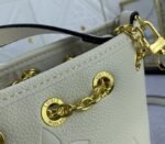 Louis Vuitton Monogram Empreinte Leather Bundle Bag In Cream - Image 8