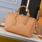 Louis Vuitton Monogram Empreinte Speedy Soft 30 Handbag In Arizona Beige