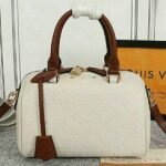 Louis Vuitton Monogram Empreinte Speedy Bandouliere 25 Handbag In Cream