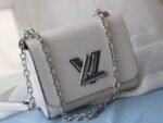 Louis Vuitton Epi Leather Twist Mini Bag In Off-White