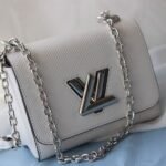 Louis Vuitton Epi Leather Twist Mini Bag In Off-White