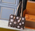 LV X TM Monogram Canvas Onthego MM With Cherry Blossom - Image 2