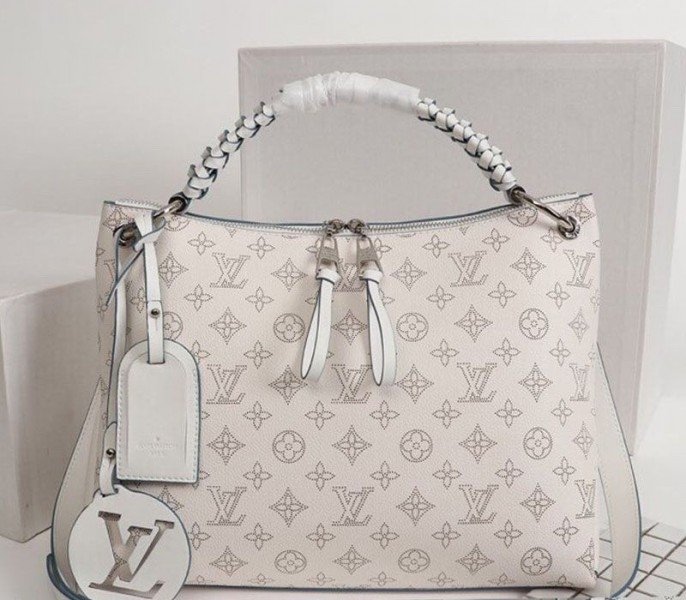 4249AA22-32B4-45EE-7BD1-DF7464418DCE.jpg LV Mahina Beaubourg MM Hobo In Off White - Image 1