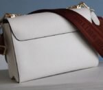 Louis Vuitton Epi Leather Twist MM Bag In Optic White With Jacquard Strap - Image 6