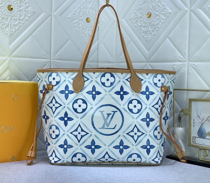 50DA6819-1530-EEF8-49BA-6558035823E7.jpg Louis Vuitton LV By The Pool Monogram Tiles Canvas Neverfull MM Tote In Lagoon Blue - Image 1