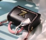 Louis Vuitton Epi Leather Twist MM Bag In Black With Braided Edges Flap - Image 5