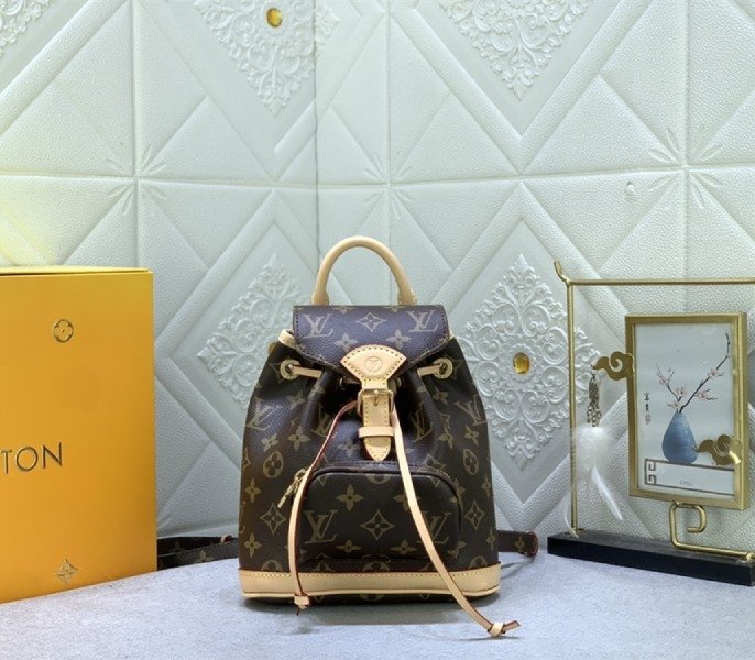 52B634D3-D2A5-97EB-059A-248C5FB9A832.jpg Louis Vuitton Monogram Canvas Montsouris Mini Backpack - Image 1