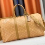 Louis Vuitton Monogram Heritage Canvas Keepall Bandouliere 50 In Yellow