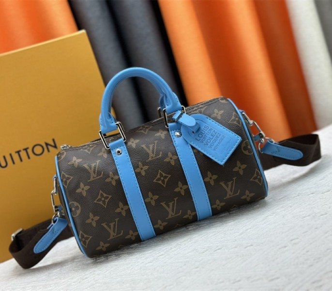 608FBD7C-2A72-4E31-FC6F-E1FA8EE300B6.jpg Louis Vuitton Monogram Macassar Canvas Keepall Bandouliere 25 In Gaston Blue - Image 1