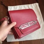 Red designer replica Hermes Mini Sac Roulis handbag - Image 7