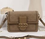 Louis Vuitton Monogram Empreinte Dauphine Bag In Brown