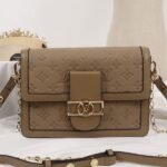 Louis Vuitton Monogram Empreinte Dauphine Bag In Brown