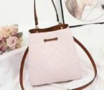 Louis Vuitton Monogram Empreinte NeoNoe MM Bag In Cream - Image 3