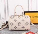 Louis Vuitton Bicolor Monogram Empreinte Leather Speedy Bandouliere 25 Handbag In Cream And Bois De Rose Pink