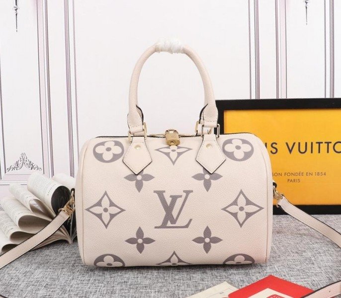 69242A64-508F-F7D2-18B6-1A698D4ECFE7.jpg Louis Vuitton Bicolor Monogram Empreinte Leather Speedy Bandouliere 25 Handbag In Cream And Bois De Rose Pink - Image 1