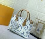 Louis Vuitton LV By The Pool Monogram Tiles Canvas Onthego PM Tote In Lagoon Blue - Image 2