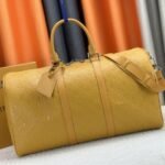 Louis Vuitton Taurillon Leather Keepall Bandouliere 50 In Safran Yellow