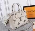 Louis Vuitton Bicolor Monogram Empreinte Leather Onthego PM Bag In Cream And Bois De Rose Pink - Image 2