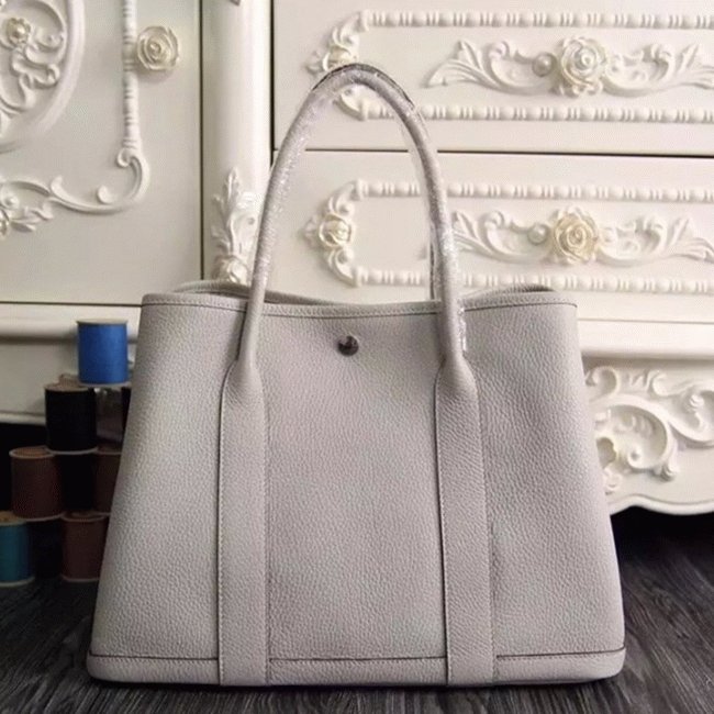 71A07887-E5F7-298A-81EE-3100EBCC0011.jpg White Top Replica Hermes Garden Party 30cm Crisp Canvas Bag - Image 1