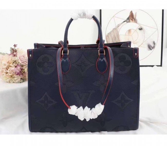 76967B23-FB4C-577D-8934-A49204347746.jpg Louis Vuitton Monogram Empreinte Giant Onthego GM Tote In Navy Blue - Image 1