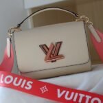 Louis Vuitton Epi Leather Twist MM Handbag In Quartz White With Gradient Strap