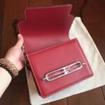 Red designer replica Hermes Mini Sac Roulis handbag - Image 4