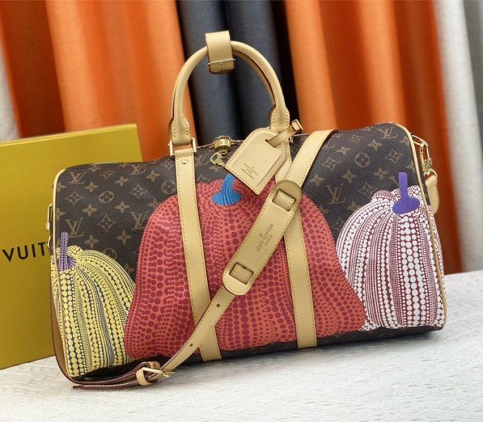 7E1D3BA2-BFB1-AF33-4D65-5EEE1DBD9681.jpg Louis Vuitton X YK Monogram Canvas Keepall 45 Luggage In Pumpkin - Image 1