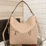 Louis Vuitton Monogram Empreinte Melie Hobo In Beige
