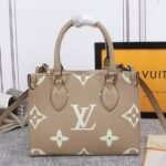 Louis Vuitton Bicolor Monogram Empreinte Leather Onthego PM Bag In Tourterelle Gray And Cream