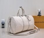 LV Monogram Empreinte Keepall Bandouliere 45 In Cream - Image 2