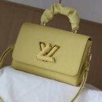Louis Vuitton Taurillon Leather Twist MM Scrunchie Handle In Ginger Yellow